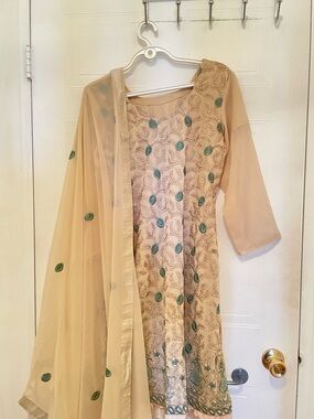 Beige Embroidered Salwar Kameez with Teal Accents